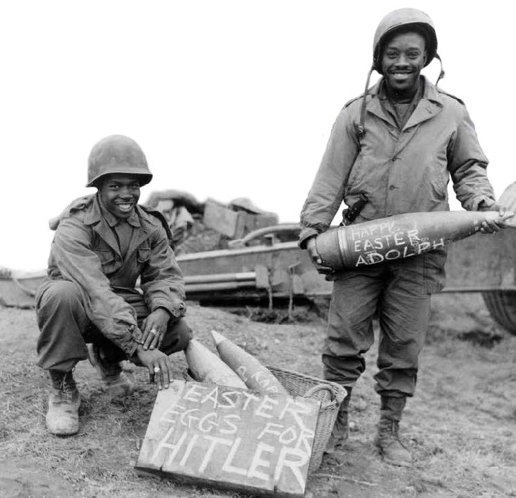 Two black American soldiers with special artillery ammo for Hitler. Photo was taken on March 10, 1945, during the Battle of Remagen.