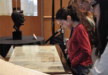 Students examine the documents