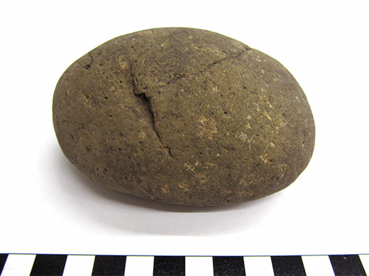  Grinding stone. Ground. Spectacle Island, MA.