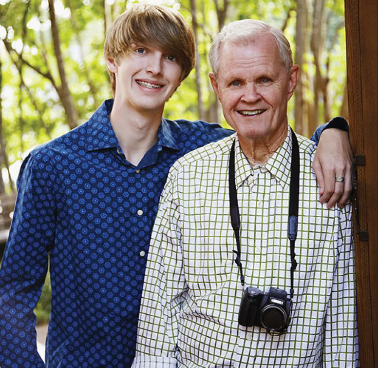 An older man and his grandson.
